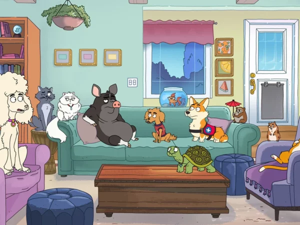 The cast of characters from HouseBroken sit around a couch in therapy